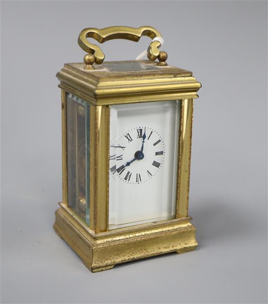 A French gilt brass miniature carriage timepiece